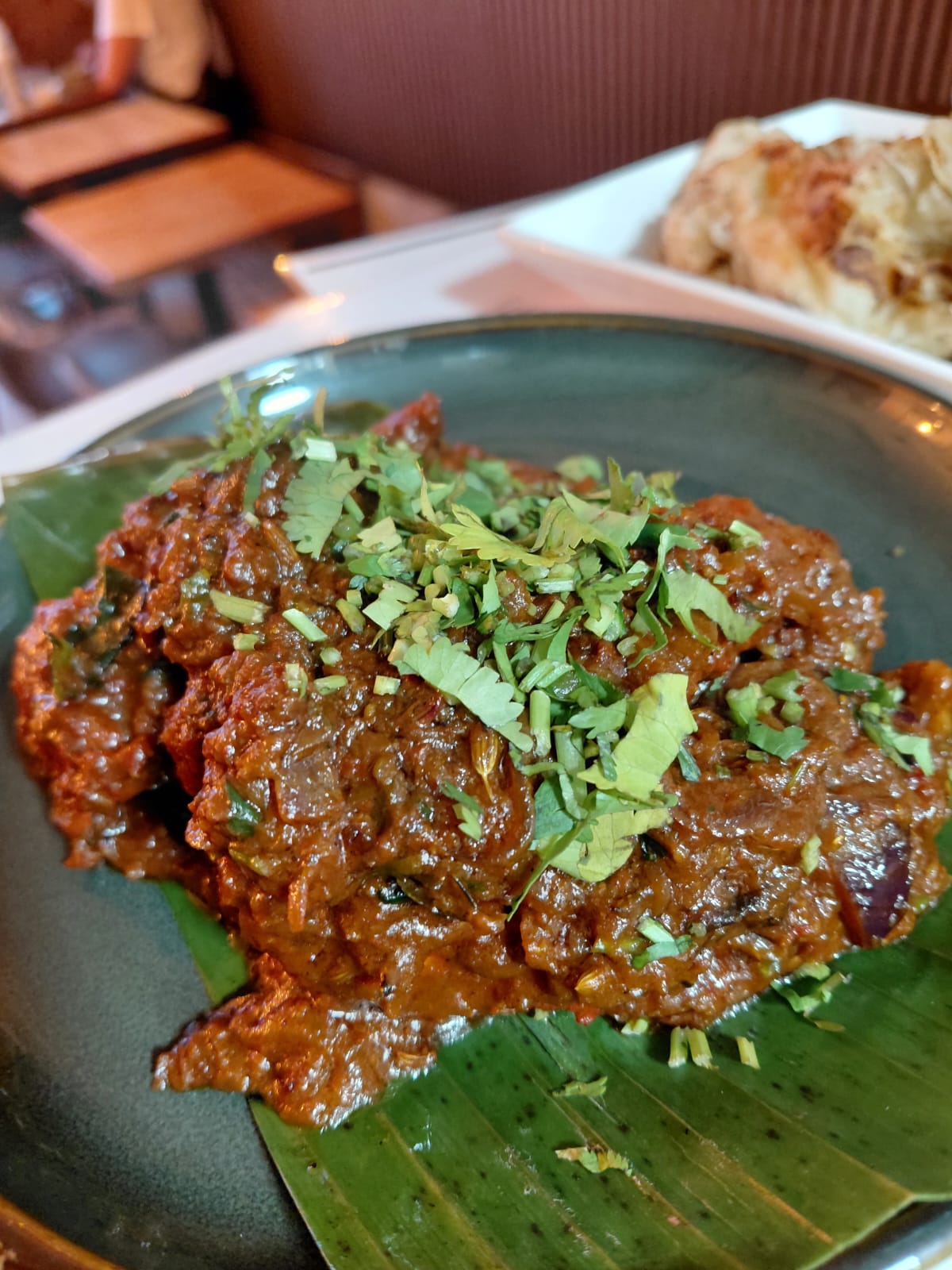 Kerala beef roast on a banana leaf