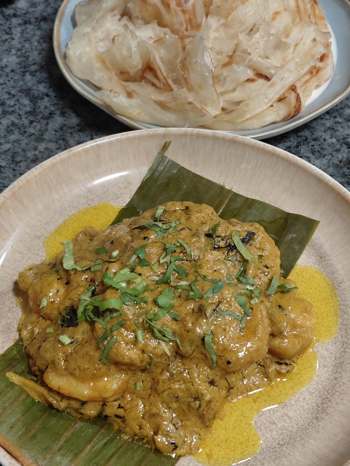 Coastal coconut prawns with Kerala porotta
